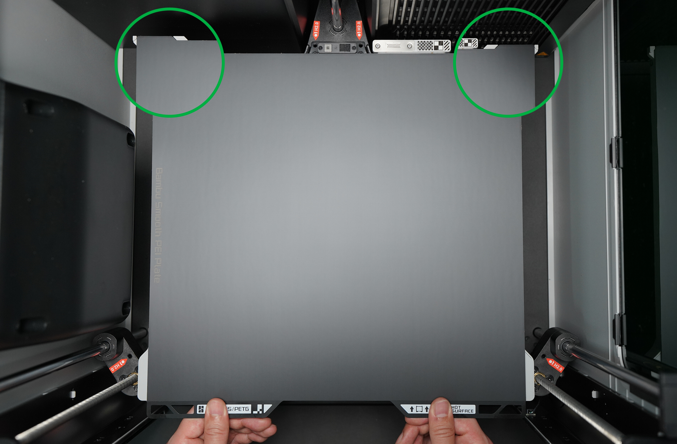 Step 1: Align the plate with the fixed points of the platform with the name of the plate facing you