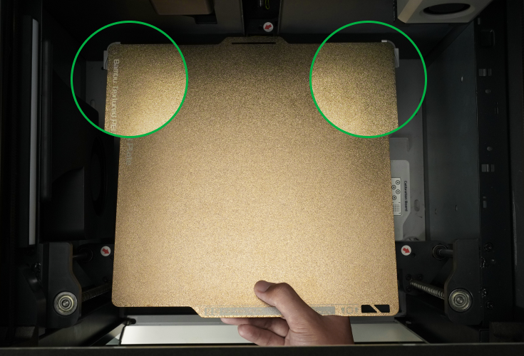 Step 1: Align the plate with the fixed points of the platform with the name of the plate facing you